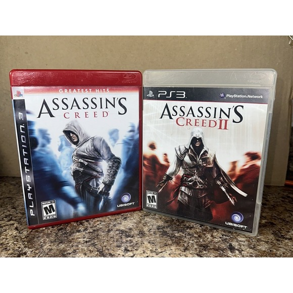 Assassin's Creed - Greatest Hits/ Assassins Creed 2  PS3, 2007 CIB Lot Of 2 - Picture 1 of 2
